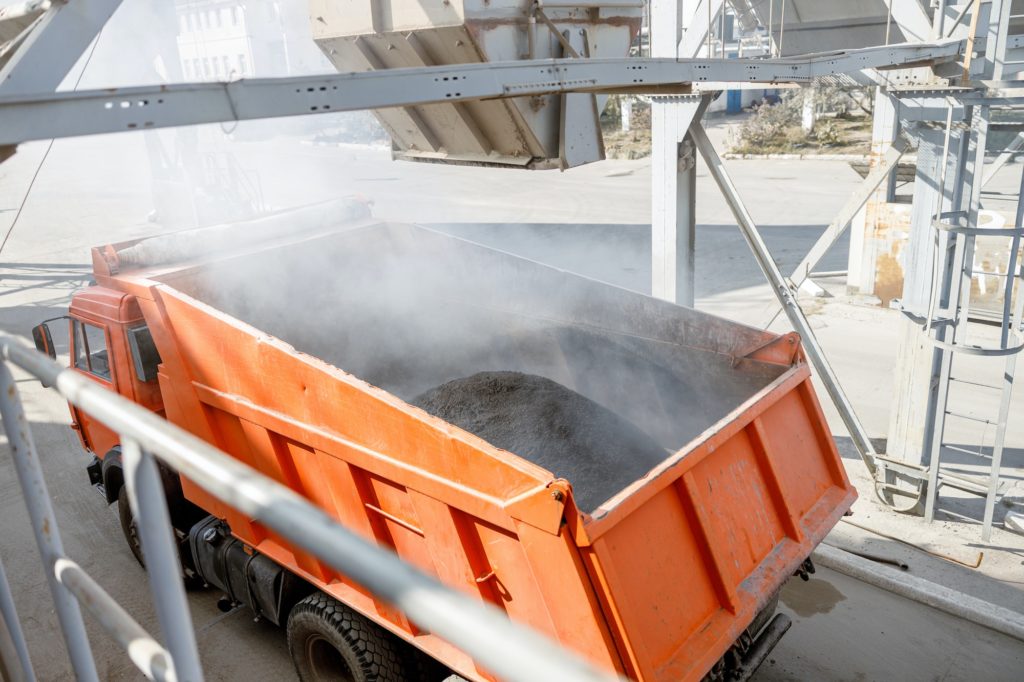 Truck loaded with building material in plant